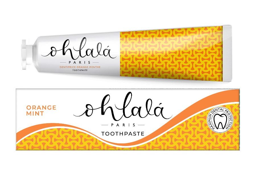 pasta de dientes de sabores naranja y menta
